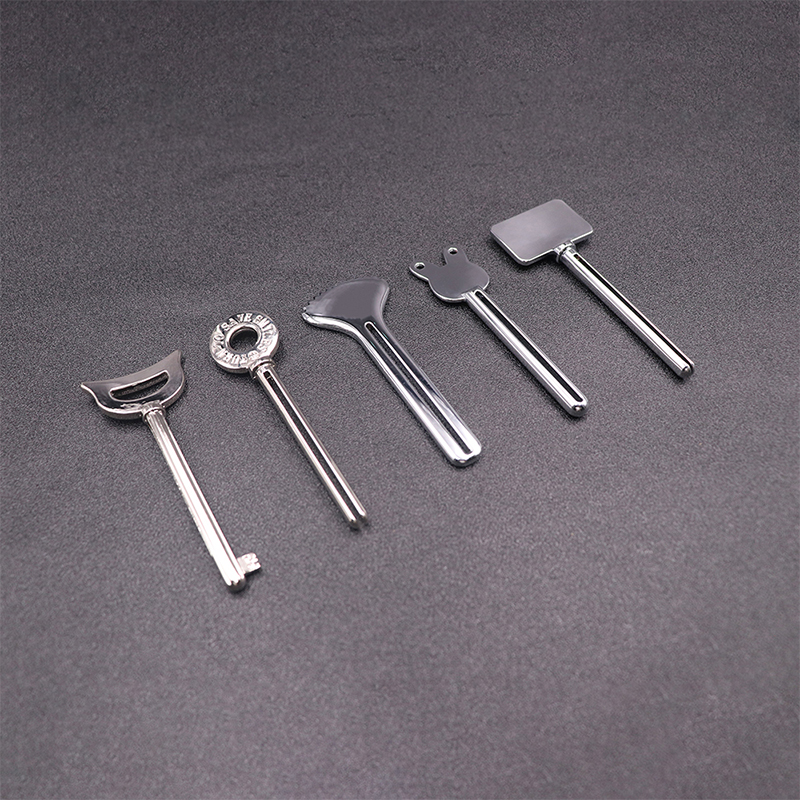 Fém fogkrém adagoló arctisztító fogkrém tubus kinyomó kulcs alak kozmetika tubus kinyomó Fém fogkrém adagoló arctisztító fogkrém tubus kinyomó kulcs alak kozmetika tubus kinyomó