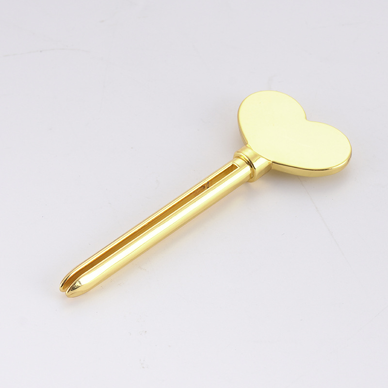 Fém fogkrém adagoló arctisztító fogkrém tubus kinyomó kulcs alak kozmetika tubus kinyomó Fém fogkrém adagoló arctisztító fogkrém tubus kinyomó kulcs alak kozmetika tubus kinyomó