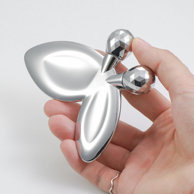 Cink ötvözet pillangó alakú arcmasszázs henger Cink ötvözet pillangó alakú arcmasszázs henger