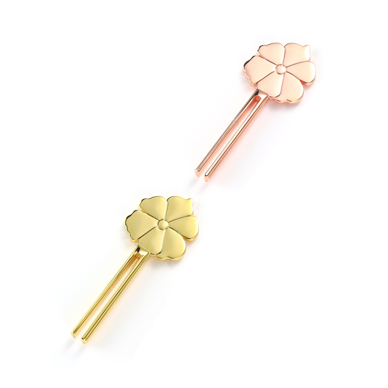 Mosolygó virág formájú cinkötvözet csőcsavaró Mosolygó virág formájú cinkötvözet csőcsavaró