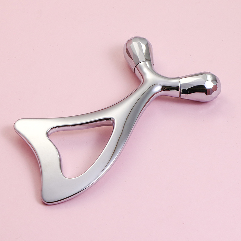 Cink ötvözet szemmasszázs görgő és arcápoló Gua Sha eszköz Cink ötvözet szemmasszázs görgő és arcápoló Gua Sha eszköz